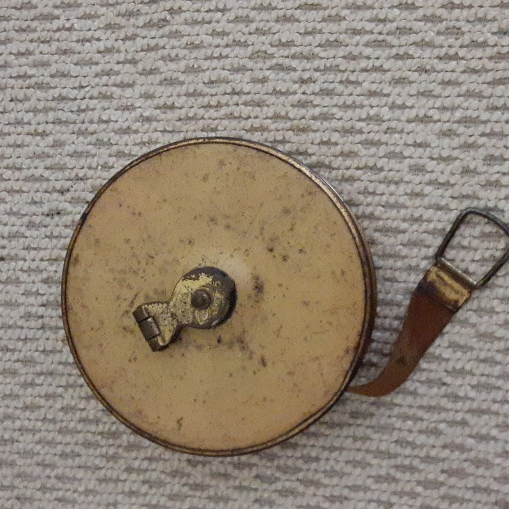 Antique Lufkin tape measure